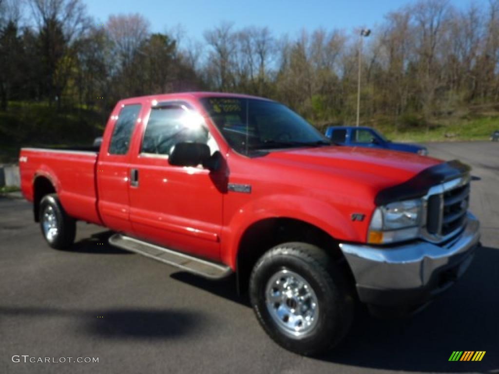 2002 F250 Super Duty XLT SuperCab 4x4 - Red Clearcoat / Medium Flint photo #1