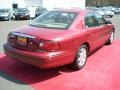 2003 Matador Red Metallic Mercury Sable LS Premium Sedan  photo #6