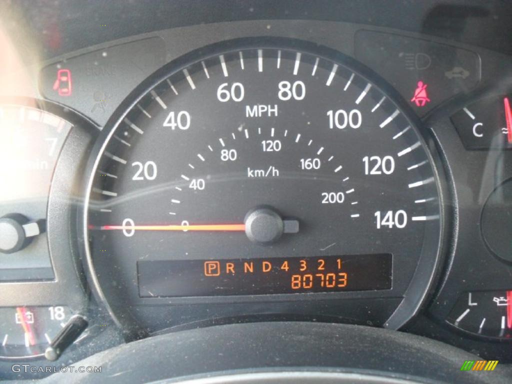2004 Titan XE Crew Cab - Copper / Sand/Steel photo #12
