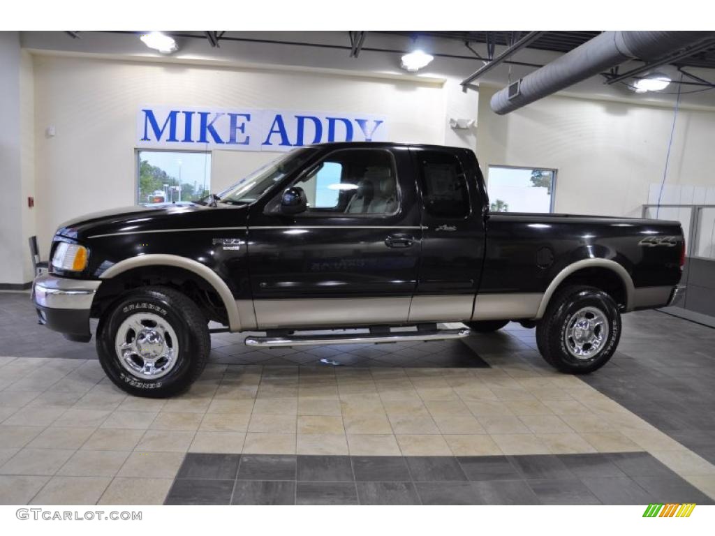 2002 F150 Lariat SuperCab 4x4 - Black / Medium Graphite photo #1