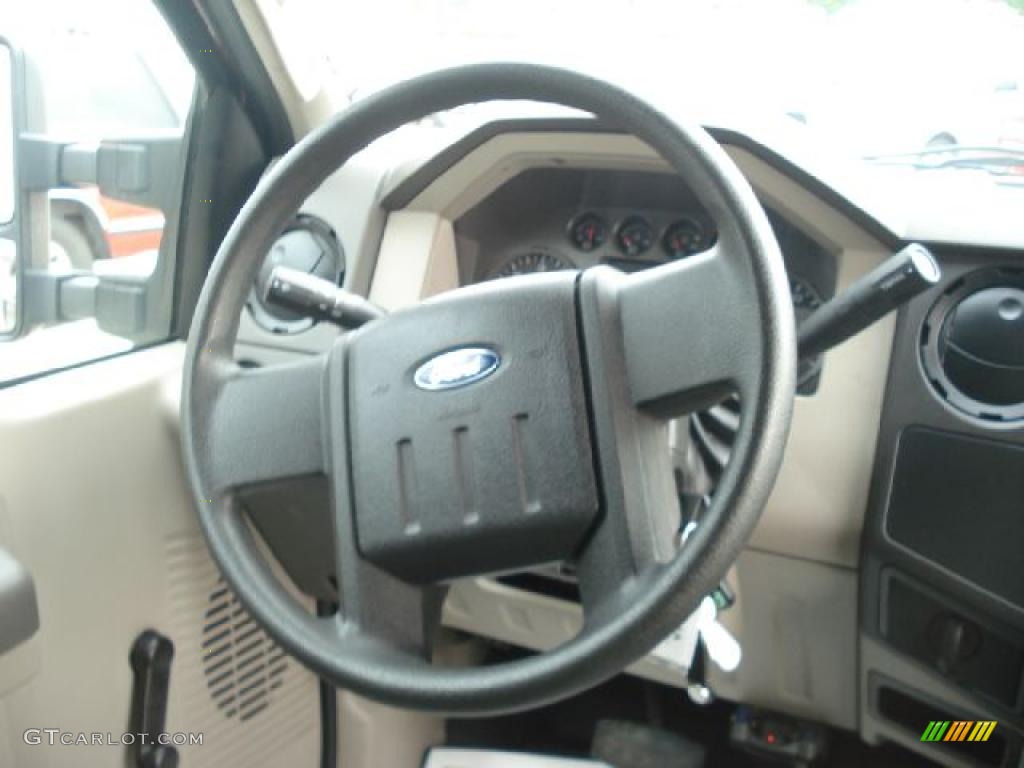 2009 Ford F350 Super Duty XL Crew Cab 4x4 Medium Stone Steering Wheel Photo #48419803
