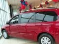 2011 Claret Red Kia Sedona LX  photo #6