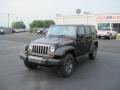 2010 Black Jeep Wrangler Unlimited Mountain Edition 4x4  photo #1