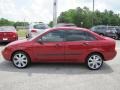 2005 Sangria Red Metallic Ford Focus ZX4 SE Sedan  photo #4