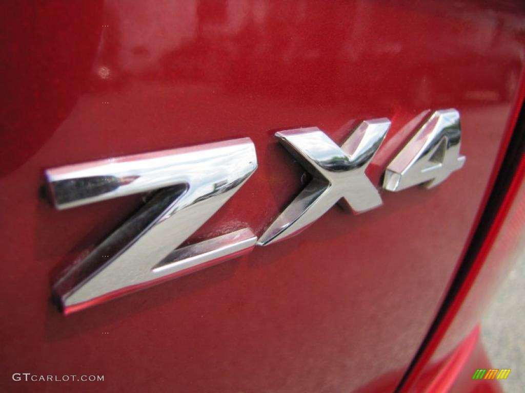 2005 Focus ZX4 SE Sedan - Sangria Red Metallic / Dark Flint/Light Flint photo #13