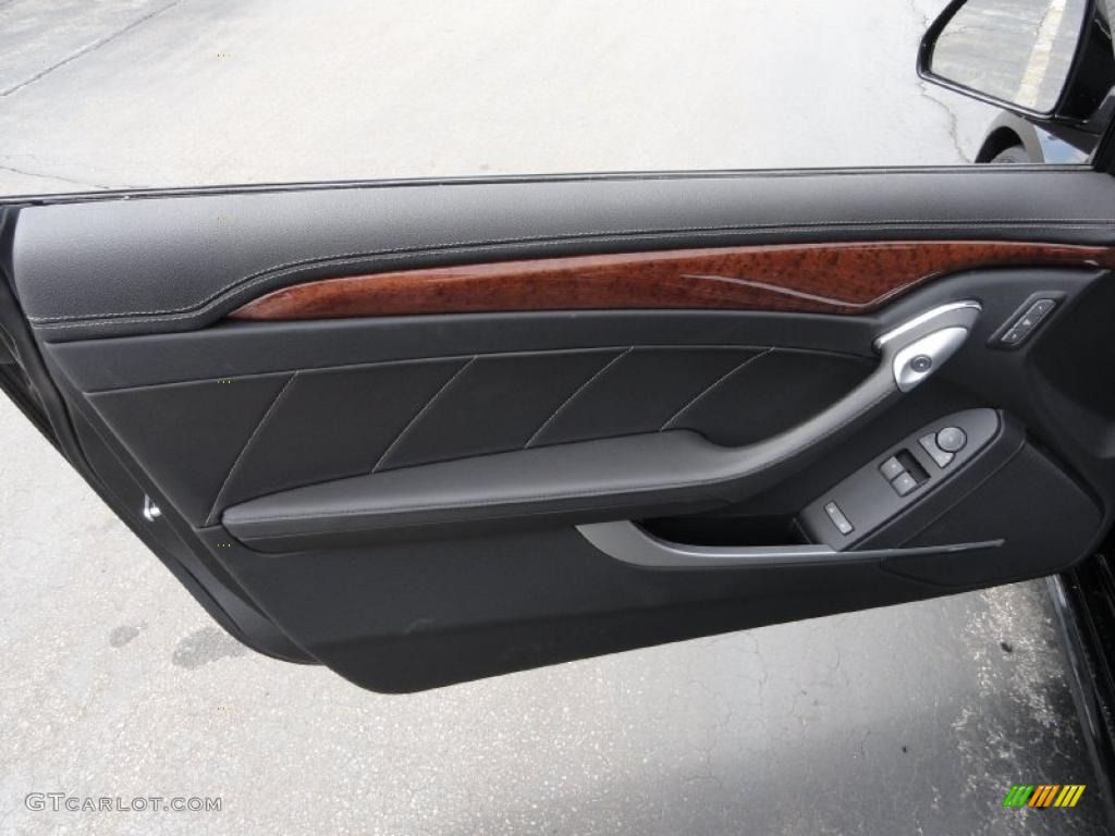2011 Cadillac CTS Coupe Ebony Door Panel Photo #48472962
