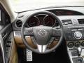 Dune Beige 2010 Mazda MAZDA3 s Sport 4 Door Steering Wheel