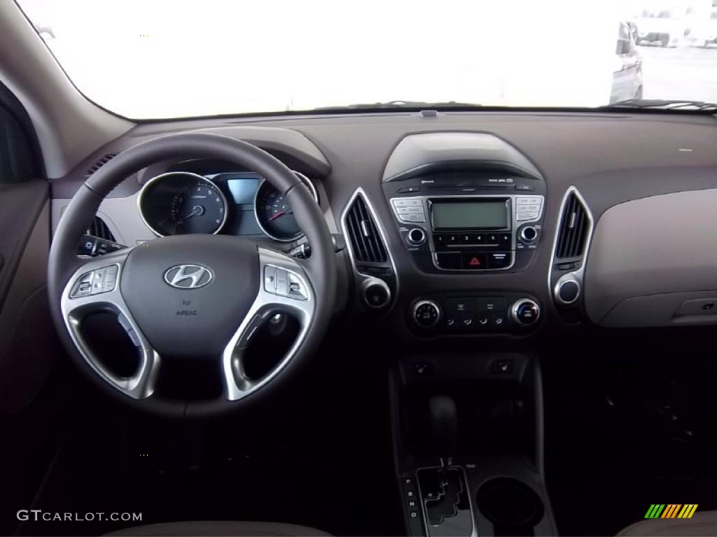 2011 Hyundai Tucson GLS AWD Taupe Dashboard Photo #48522529