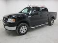 2005 Black Ford F150 XLT SuperCrew 4x4  photo #1