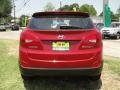 2011 Garnet Red Hyundai Tucson GL  photo #4