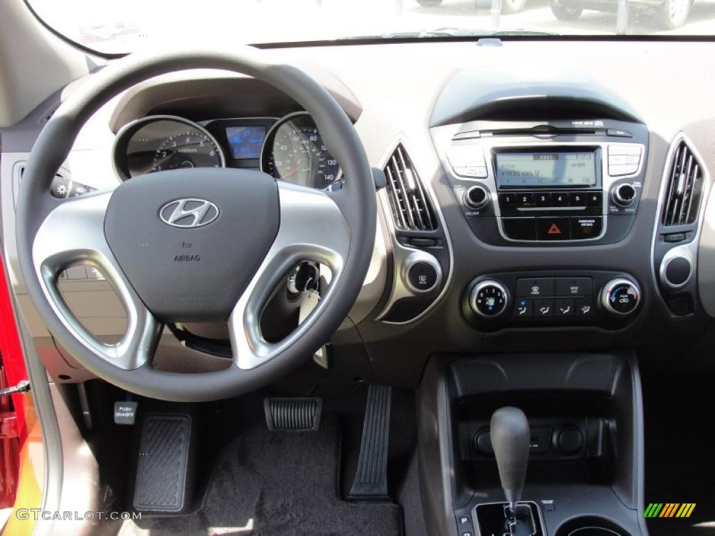 2011 Hyundai Tucson GL Taupe Dashboard Photo #48532843