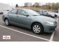 2010 Aloe Green Metallic Toyota Camry LE  photo #1