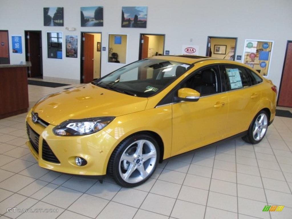 Yellow Blaze Tricoat Metallic 2012 Ford Focus Titanium Sedan Exterior Photo #48547132