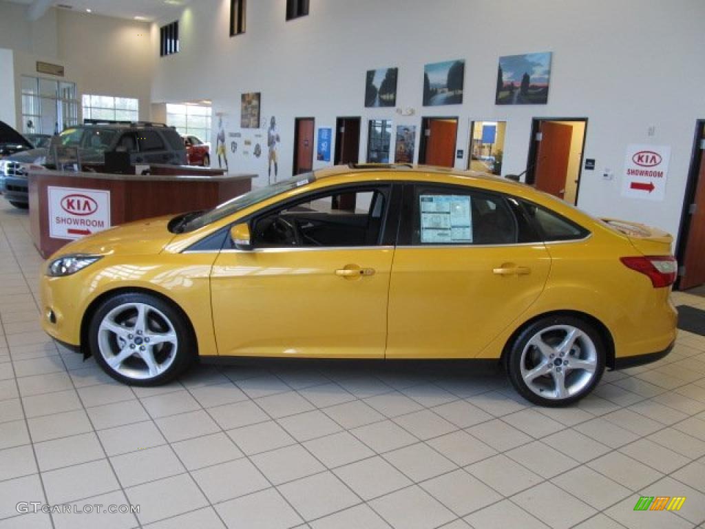 Yellow Blaze Tricoat Metallic 2012 Ford Focus Titanium Sedan Exterior Photo #48547136