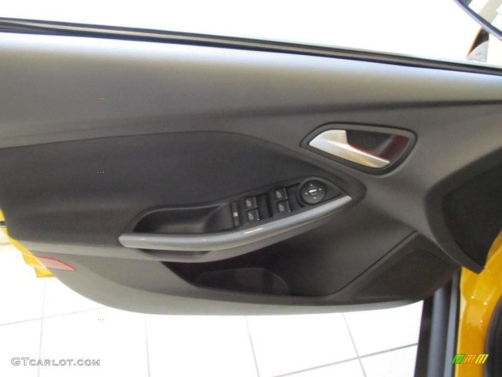 2012 Ford Focus Titanium Sedan Charcoal Black Leather Door Panel Photo #48547220