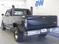 1997 Black Ford F250 XLT Extended Cab 4x4  photo #3