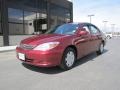 2003 Salsa Red Pearl Toyota Camry LE  photo #1