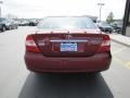 2003 Salsa Red Pearl Toyota Camry LE  photo #24