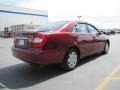 2003 Salsa Red Pearl Toyota Camry LE  photo #25