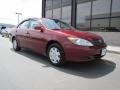 2003 Salsa Red Pearl Toyota Camry LE  photo #28