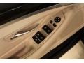 Oyster/Black Controls Photo for 2011 BMW 5 Series #48611594
