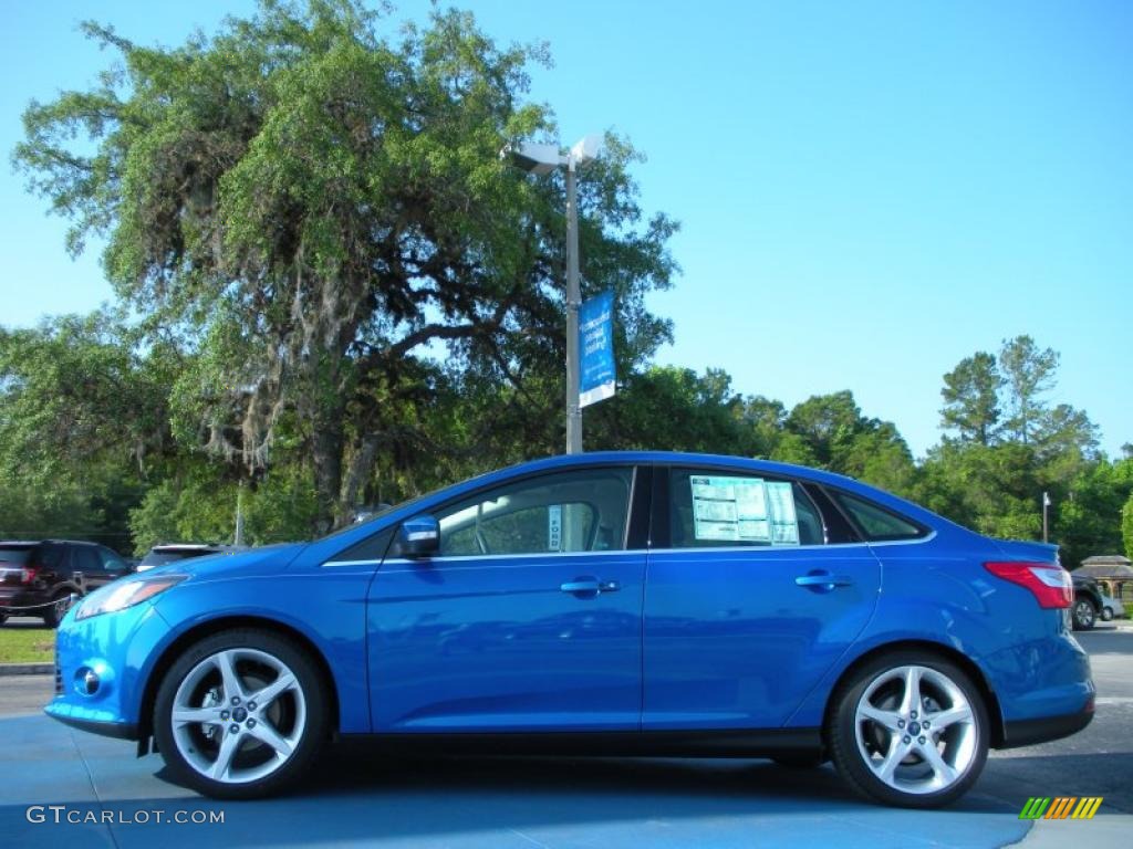 Blue Candy Metallic 2012 Ford Focus Titanium Sedan Exterior Photo #48634037