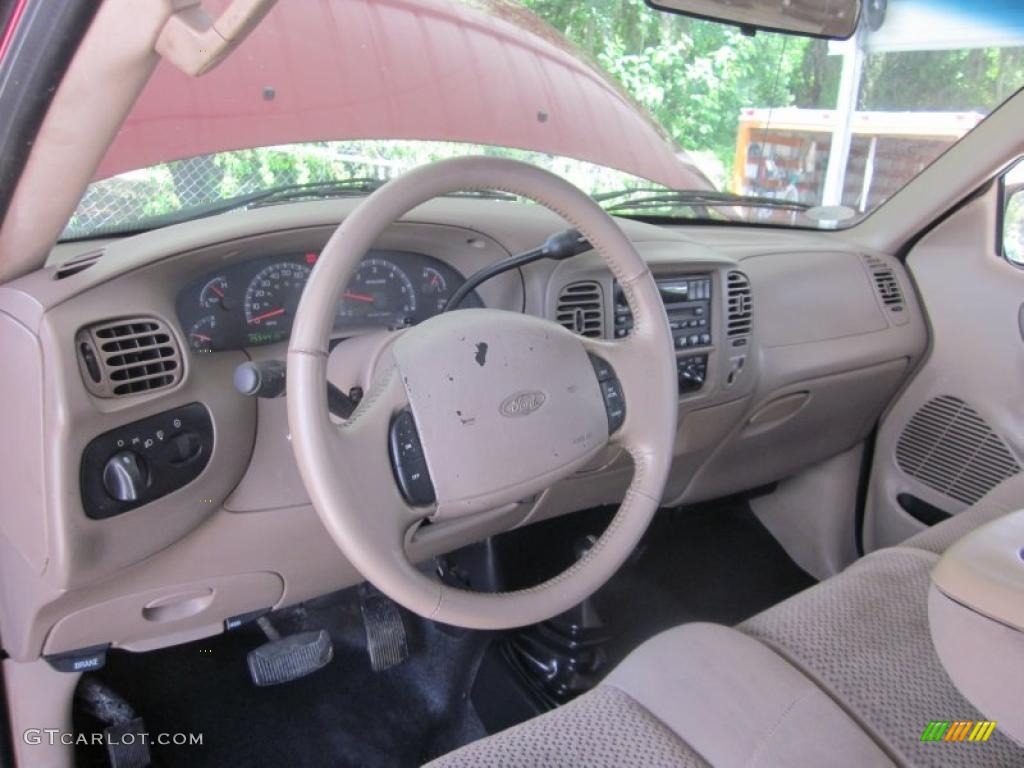 2002 F150 XL SuperCab 4x4 - Bright Red / Medium Parchment photo #28