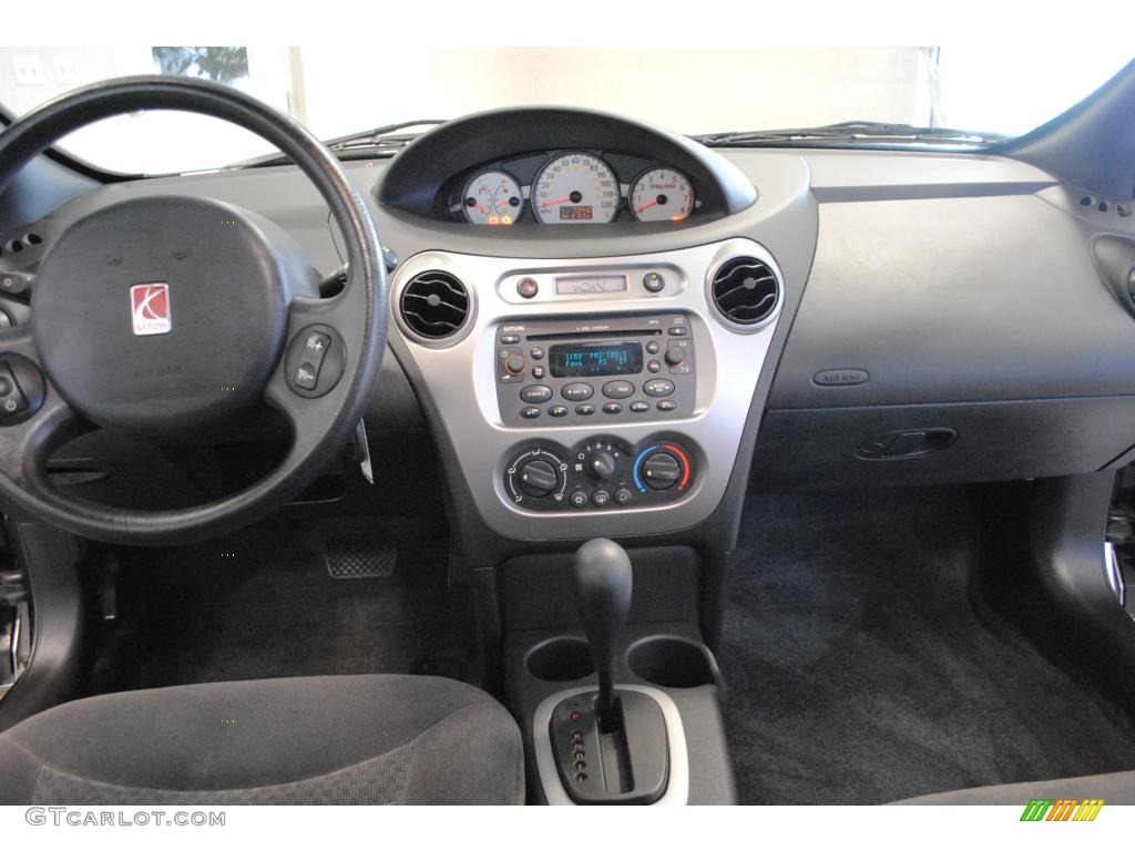 2004 Saturn ION 3 Quad Coupe Black Dashboard Photo #48672679