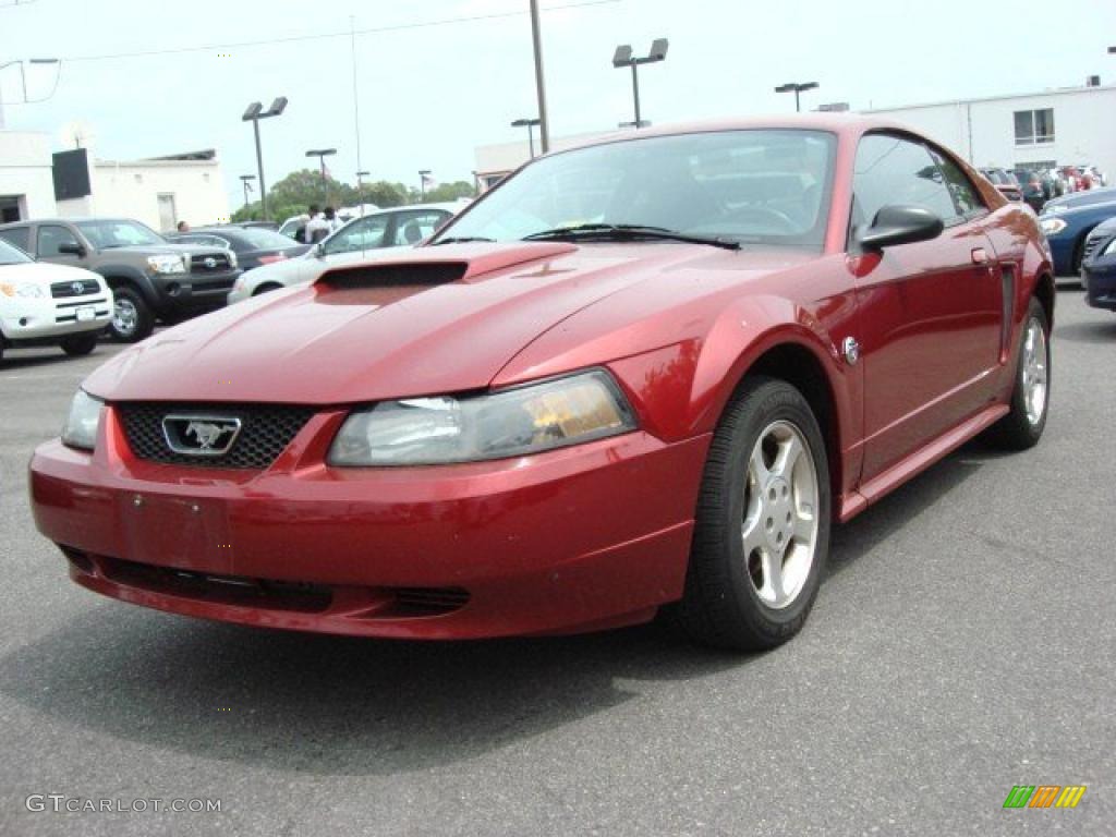 Redfire Metallic 2004 Ford Mustang V6 Coupe Exterior Photo #48717860