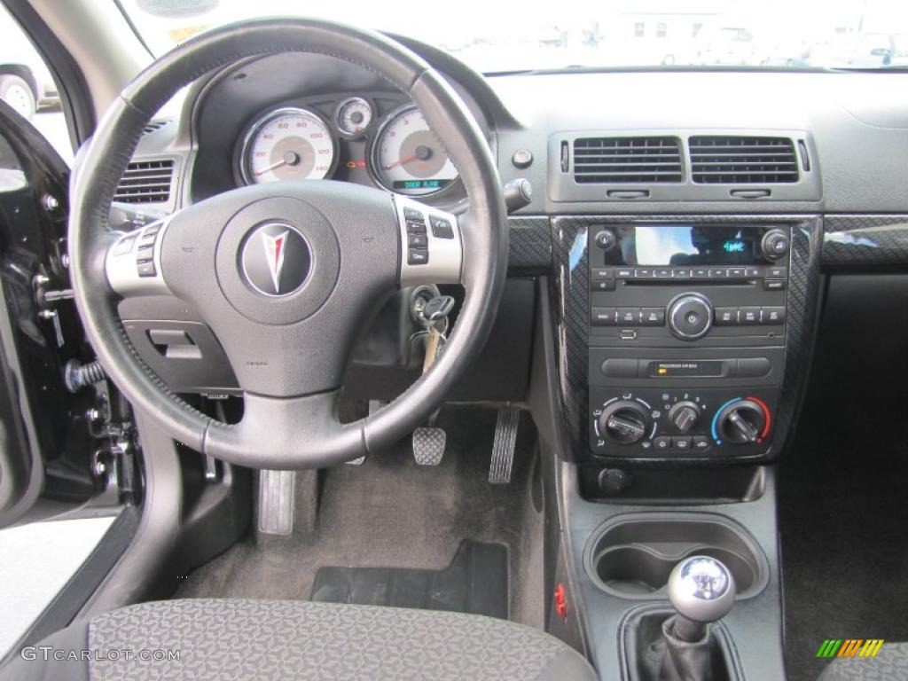 2009 Pontiac G5 XFE Ebony Dashboard Photo #48723944