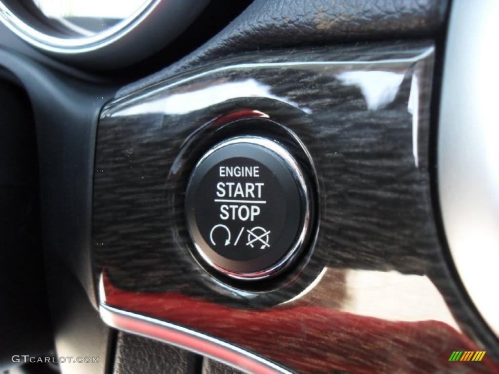 2011 Jeep Grand Cherokee Laredo X 70th Anniversary 4x4 Controls Photo #48739470