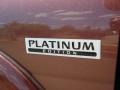  2004 Pathfinder LE Platinum Logo