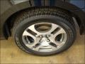 2005 Saturn ION 3 Quad Coupe Wheel and Tire Photo