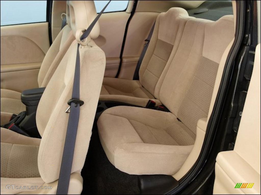 Tan Interior 2005 Saturn ION 3 Quad Coupe Photo #48755266