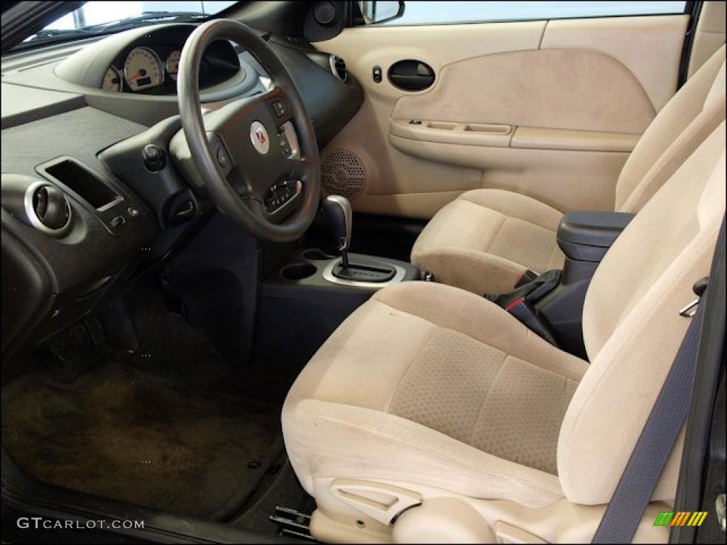Tan Interior 2005 Saturn ION 3 Quad Coupe Photo #48755284