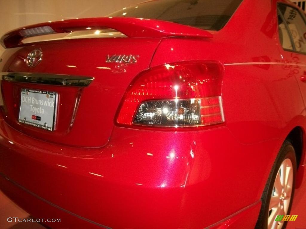 2011 Yaris S Sedan - Barcelona Red Metallic / Dark Charcoal photo #18