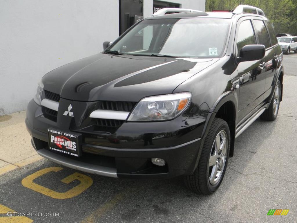 2006 Outlander SE 4WD - Labrador Black Pearl / Charcoal photo #1