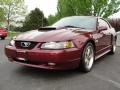 2004 40th Anniversary Crimson Red Metallic Ford Mustang GT Coupe  photo #3