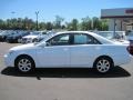 2004 Super White Toyota Camry LE  photo #2