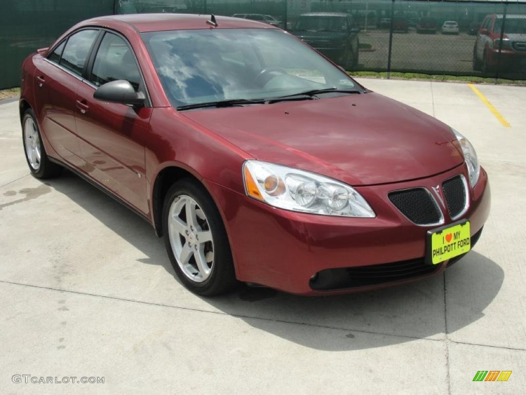 2009 G6 GT Sedan - Performance Red Metallic / Ebony photo #1