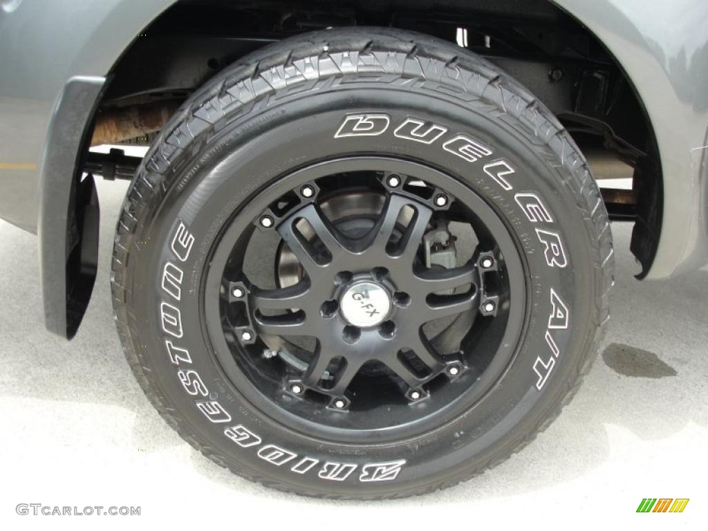 2009 Nissan Frontier SE Crew Cab 4x4 Custom Wheels Photo #48812598