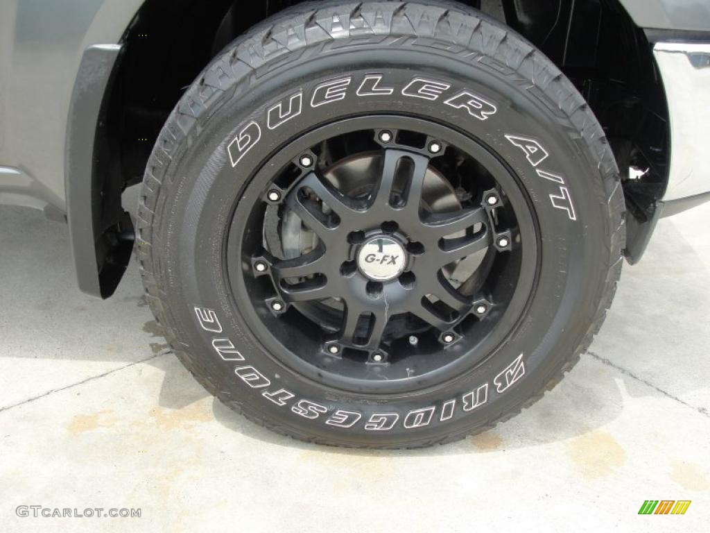 2009 Nissan Frontier SE Crew Cab 4x4 Custom Wheels Photos