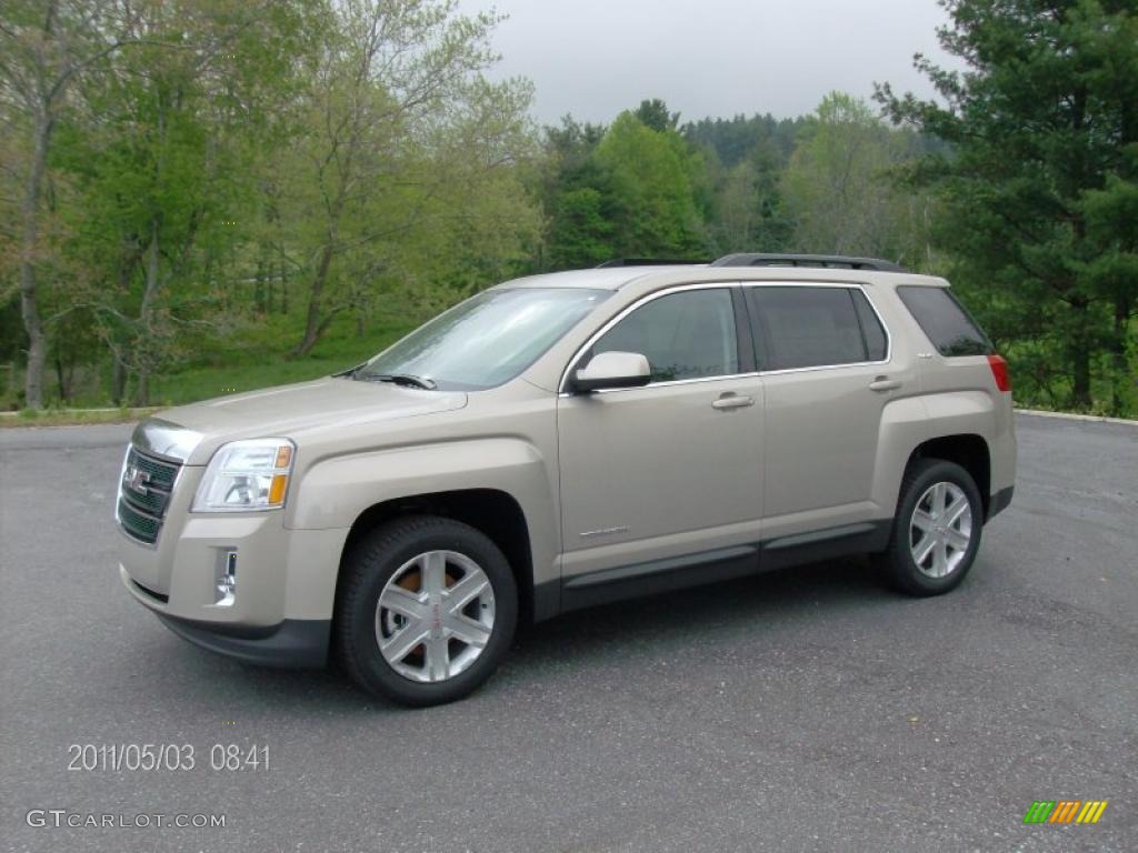 2011 Terrain SLE AWD - Gold Mist Metallic / Jet Black photo #1