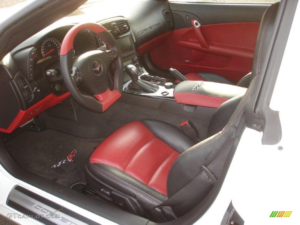 Ebony/Red Interior 2009 Chevrolet Corvette Coupe Photo #48840999