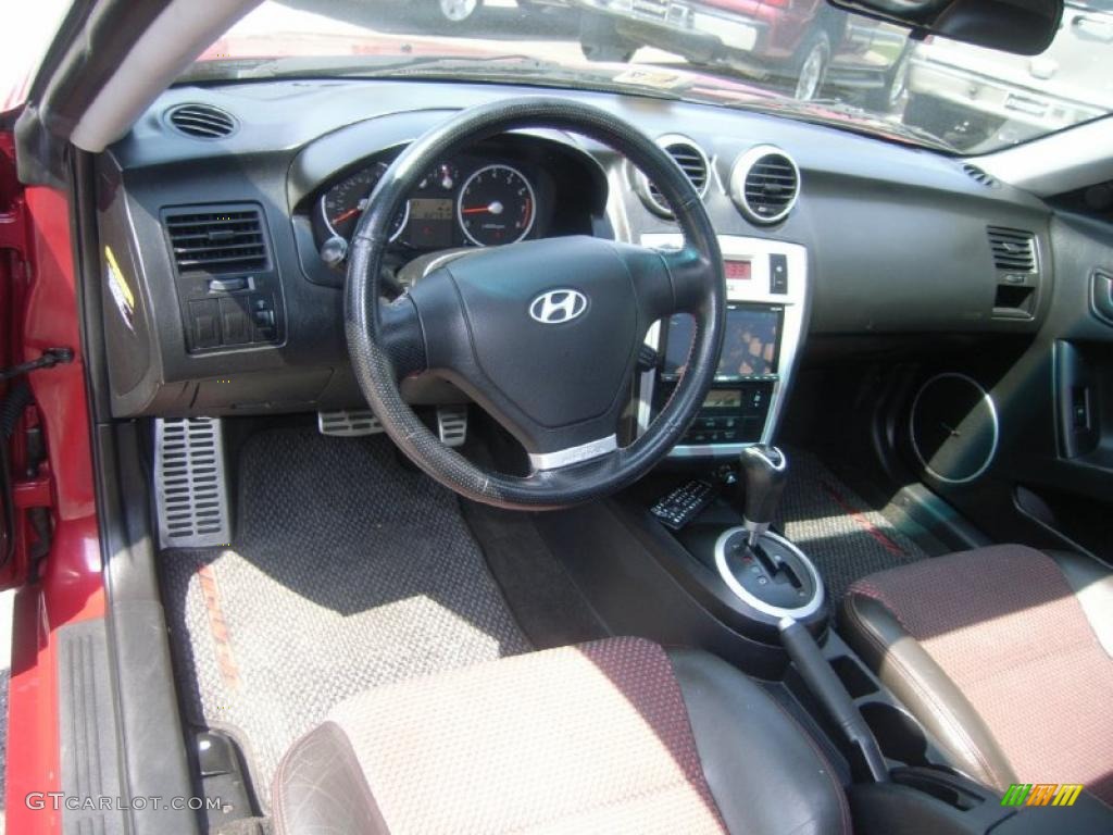 2006 Hyundai Tiburon GT Black/Red Steering Wheel Photo #48843765