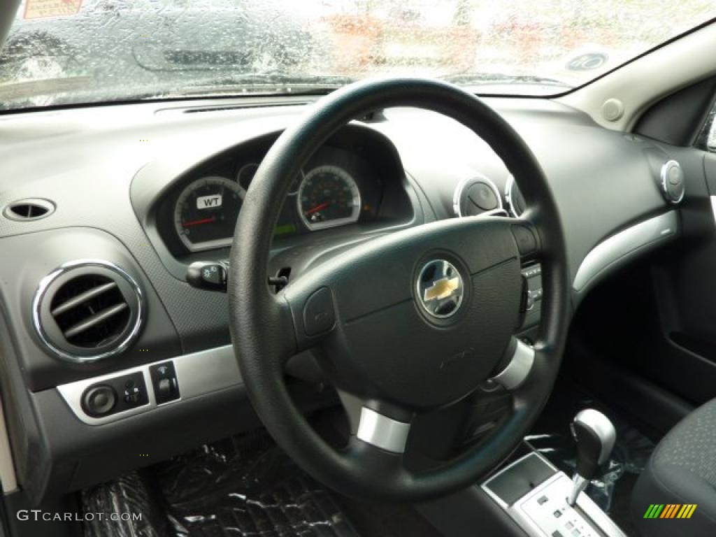 2011 Chevrolet Aveo LT Sedan Charcoal Steering Wheel Photo #48850510