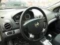 Charcoal Steering Wheel Photo for 2011 Chevrolet Aveo #48850510