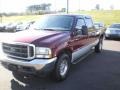 2004 Dark Toreador Red Metallic Ford F250 Super Duty Lariat SuperCab  photo #2