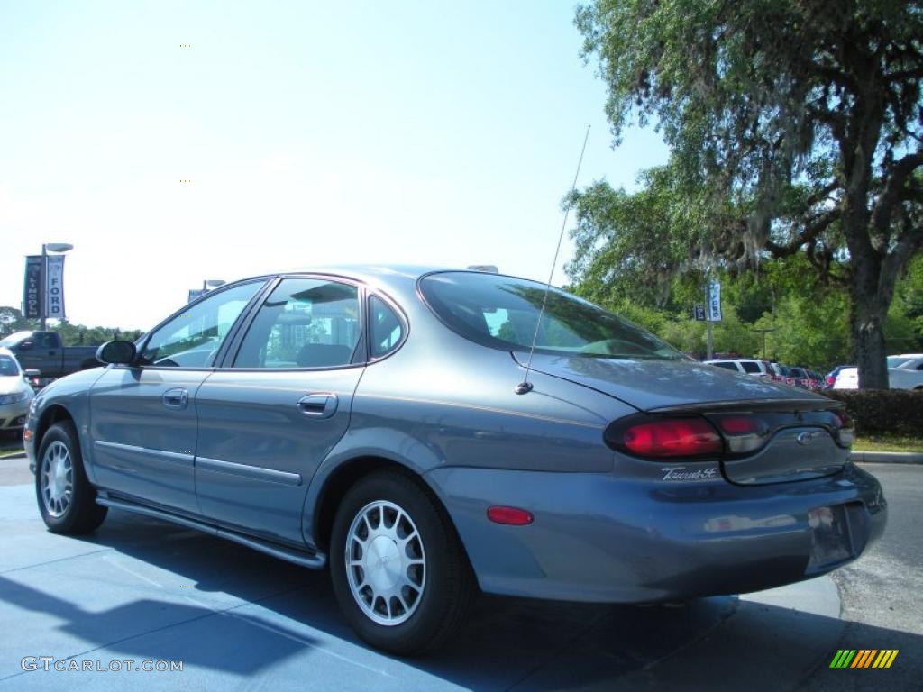 Graphite Blue Metallic 1999 Ford Taurus SE Exterior Photo #48868215