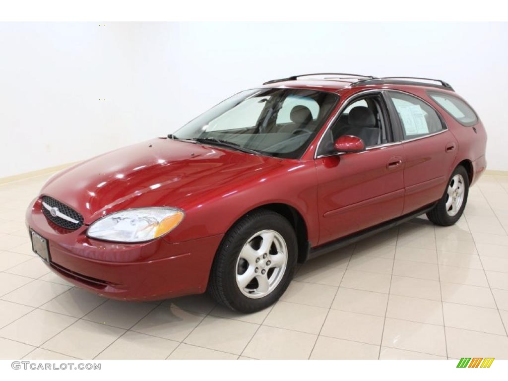 Matador Red Metallic 2003 Ford Taurus SE Exterior Photo #48877581